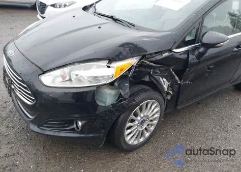 2016 Ford Fiesta Titanium из США, поврежденный, VIN 3FADP4CJ1GM118712